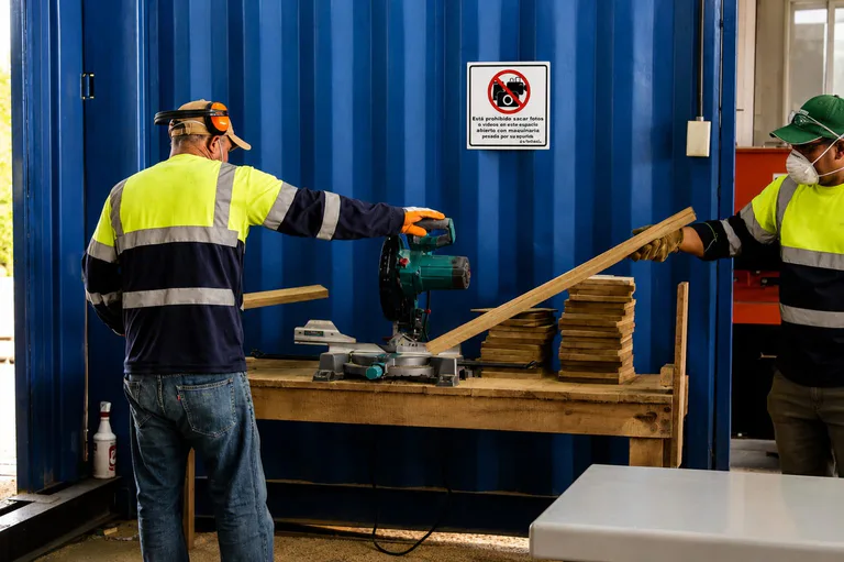 Sawmill workers preparing teak boards in Panama
